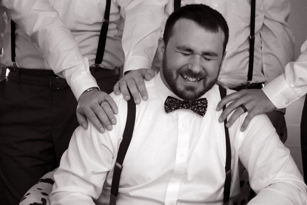 groom preparation photo groomsmen