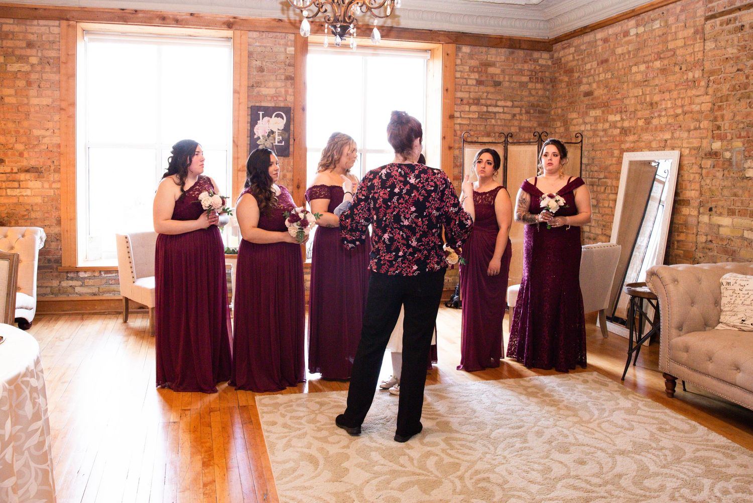 Deborah Parker chicago wedding photographer talking to bridesmaids first look