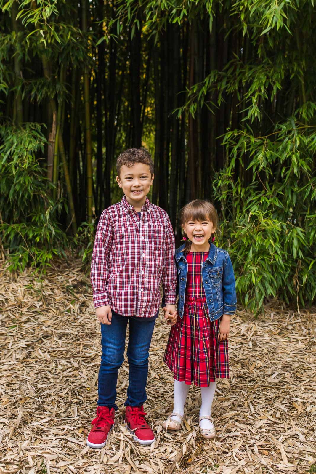 A brother and sister holding hands in Kirkland Washington