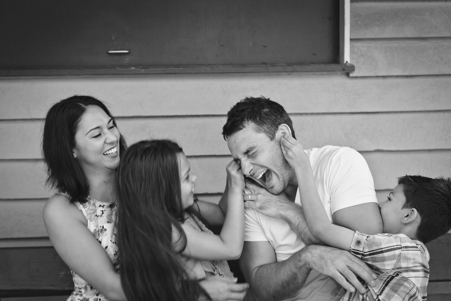dad and kids playing fun family photo shoot old petrie town brisbane