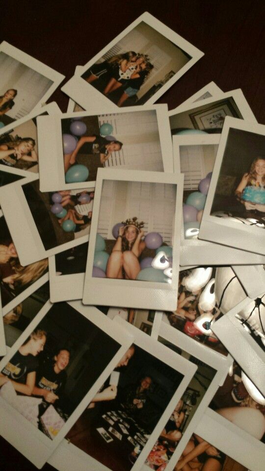 A collection of vintage-style polaroid photos scattered on a dark surface with balloon decorations visible.