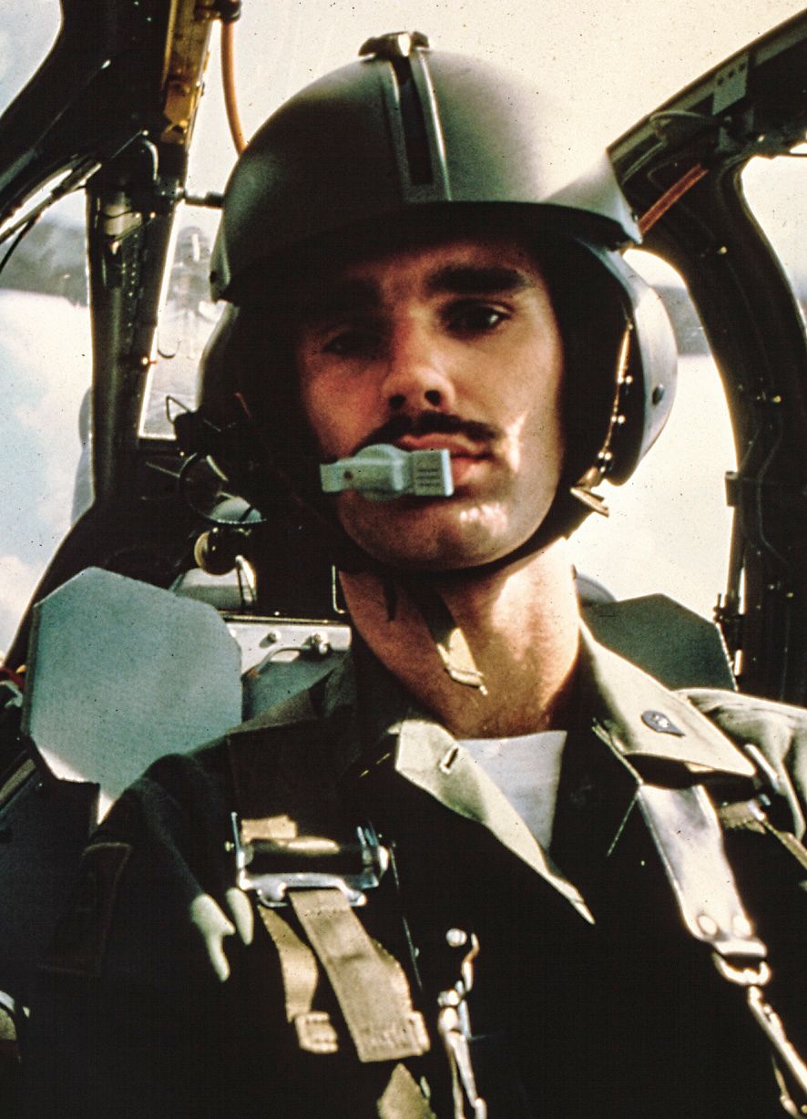 Selfie before selfies were a thing. Gunner seat of a Cobra helicopter. Ft Bragg NC 1978