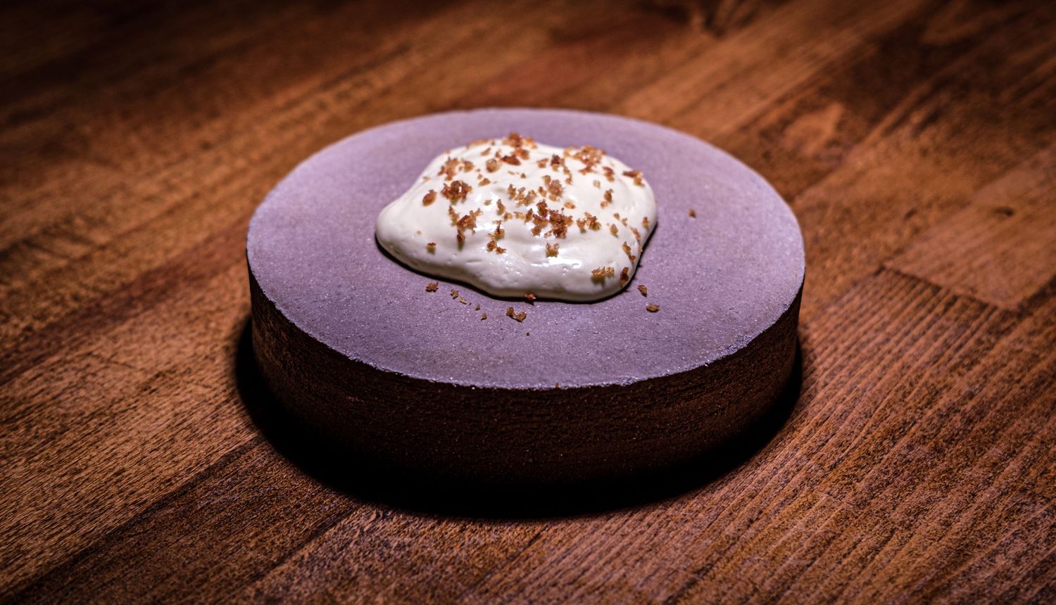 A creamy emulsion on a round dish