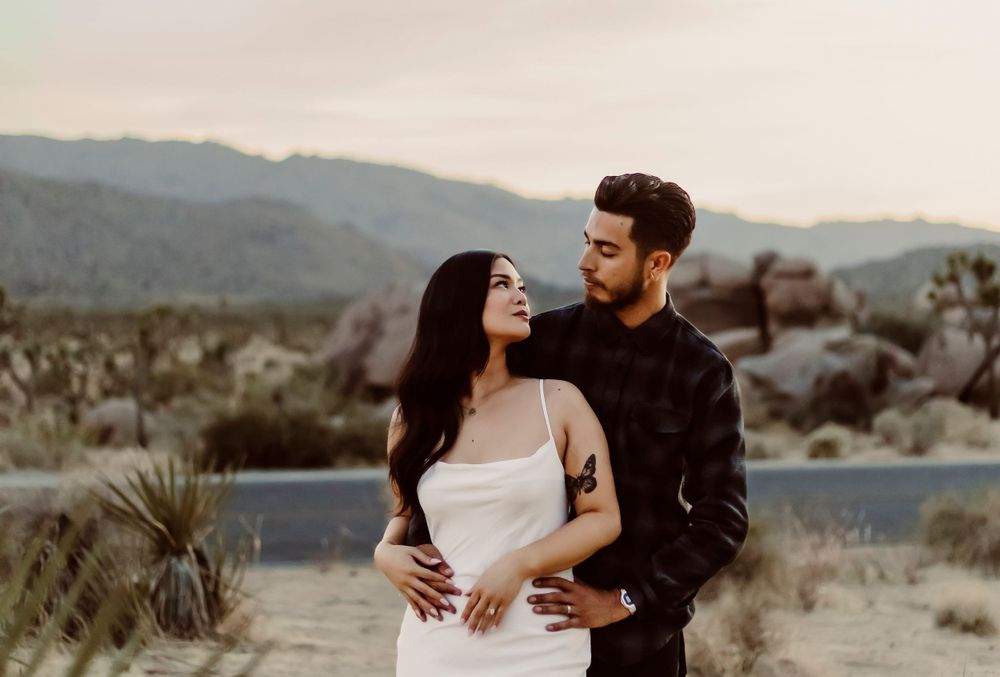 Engaged couple enjoying their Joshua Tree Engagement Photography session