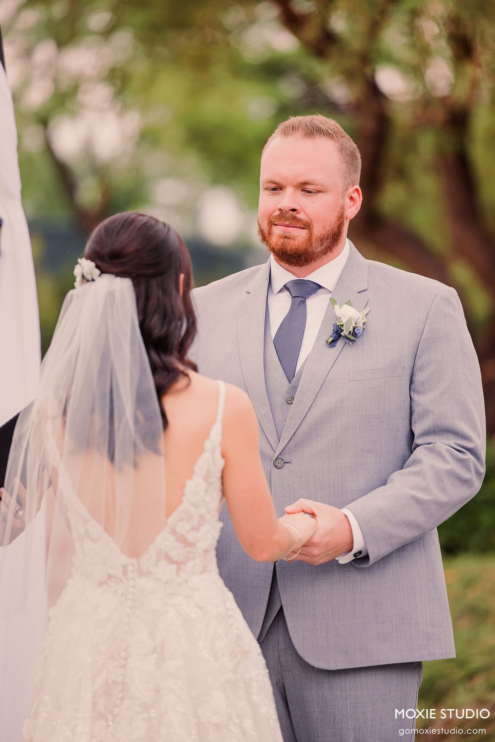sachin and babi light blue dress A Blue & White Spring Wedding at Caledonia Golf Club - Caroline & Sam main image 1