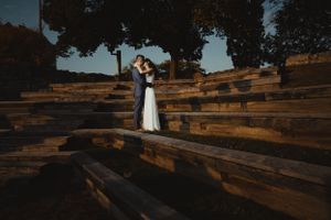 Bride and Groom hugging while in the stairs