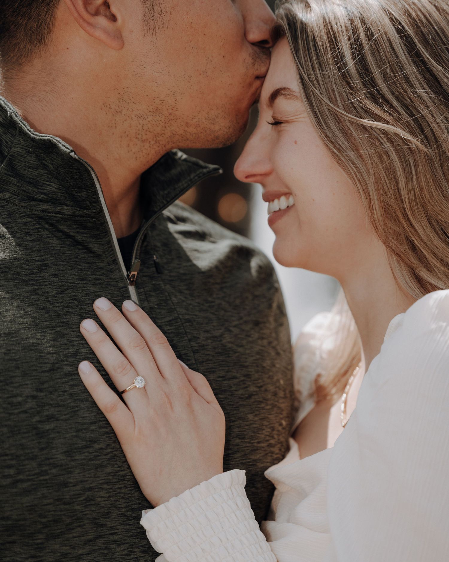 Engaged couple smiling