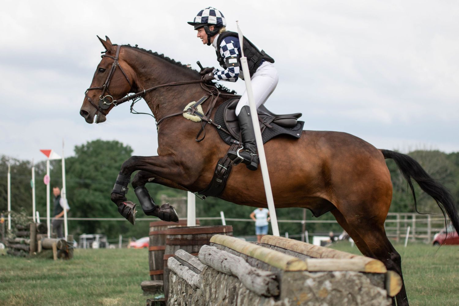 Series of action shots showing horses and riders navigating cross-country jumping obstacles.