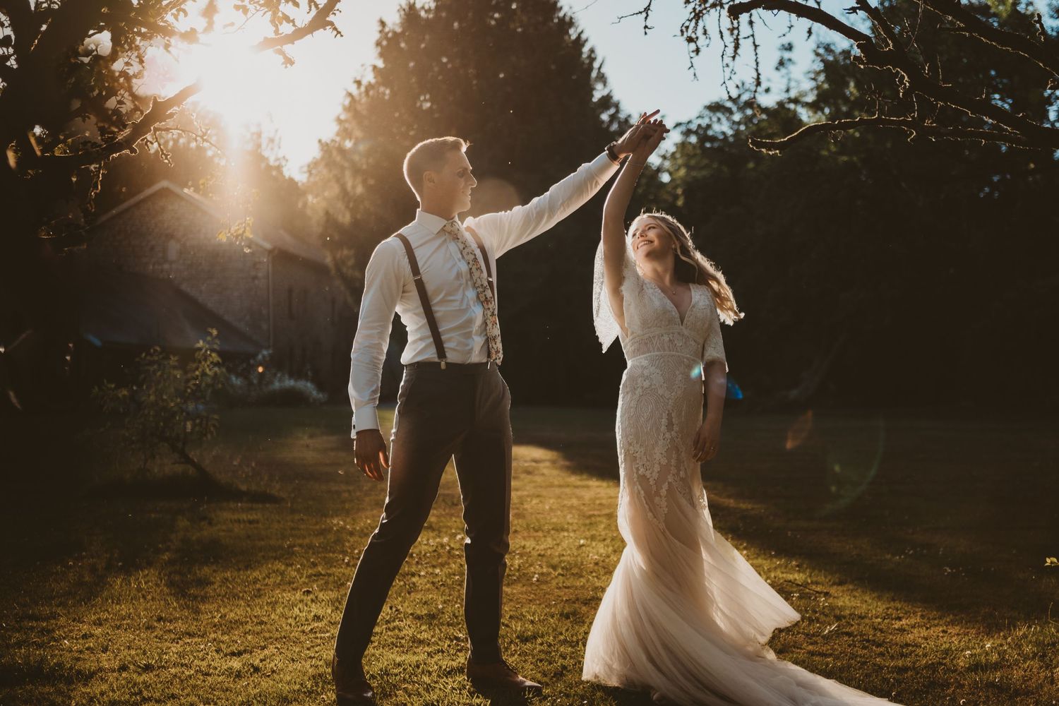 Bride and Groom dancing in the evening sun