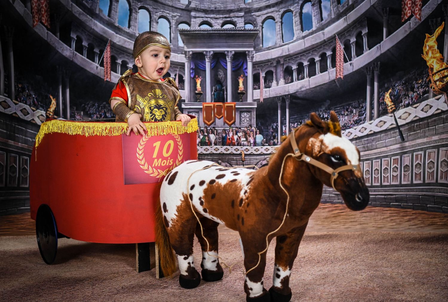 Bull riding event in circular arena with decorative architectural details.