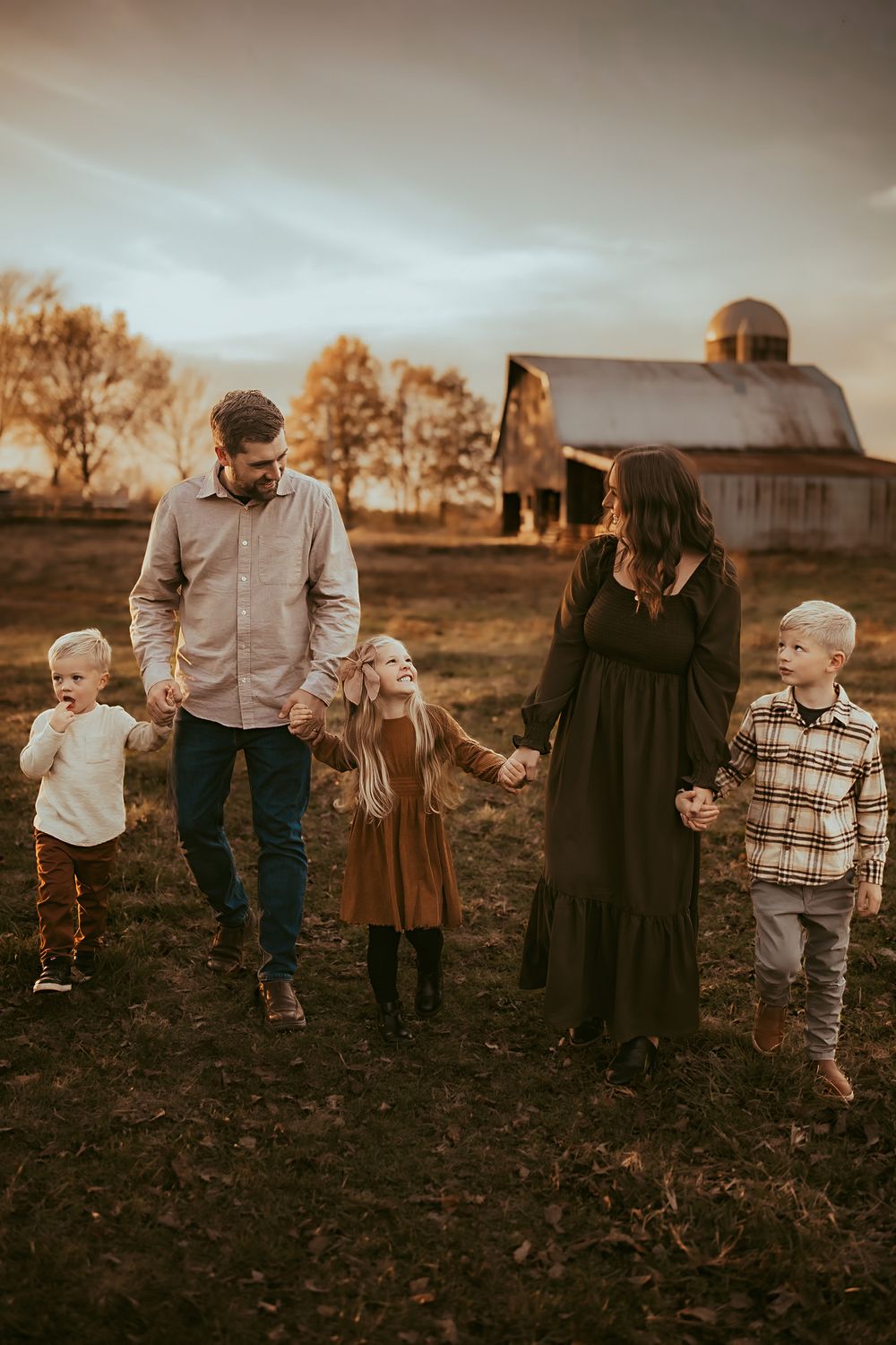 Family walking on family farm in Old Monroe, Missouri.