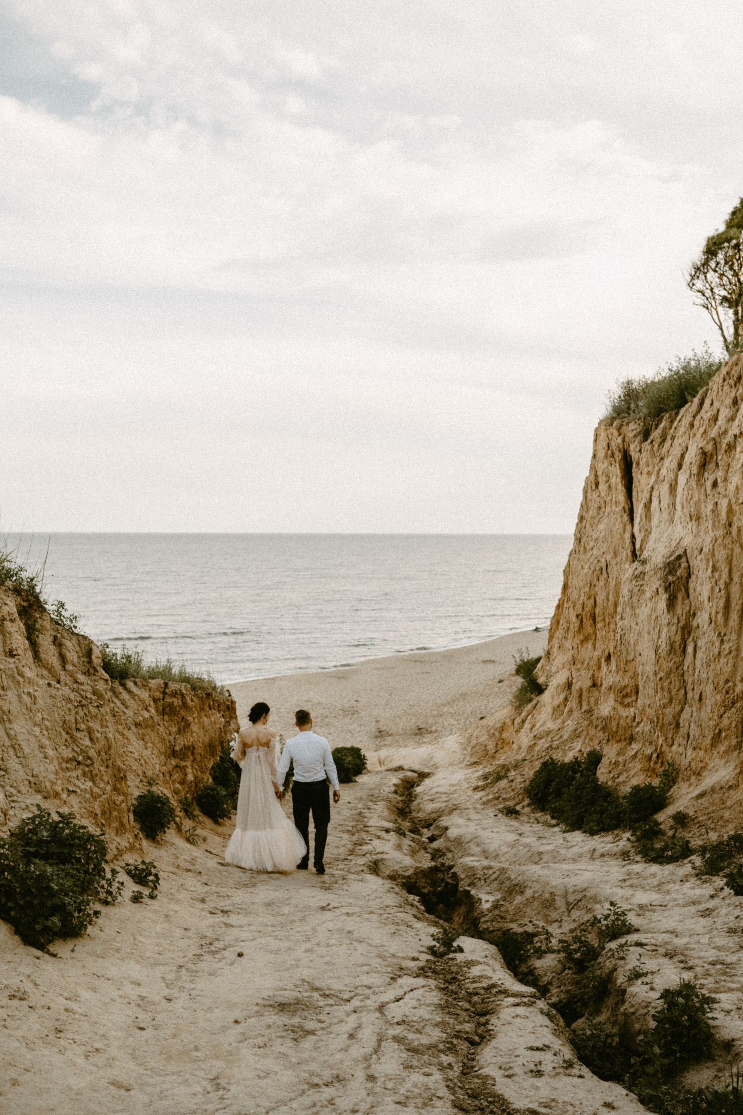 Wedding Couple by a stunning beach / Best European Elopement locations.