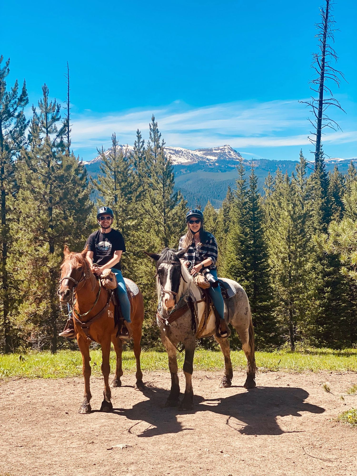 west Yellowstone couple sat on some horses