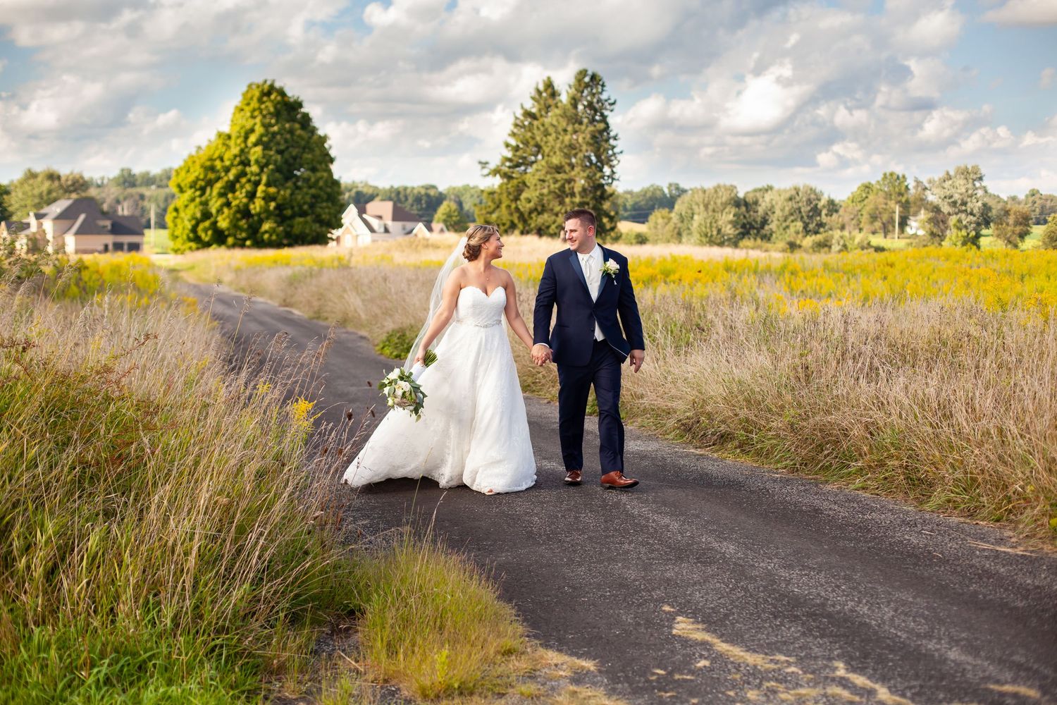 wedding held in barberton ohio, farm wedding with bride and groom, wedding in a field in Ohio