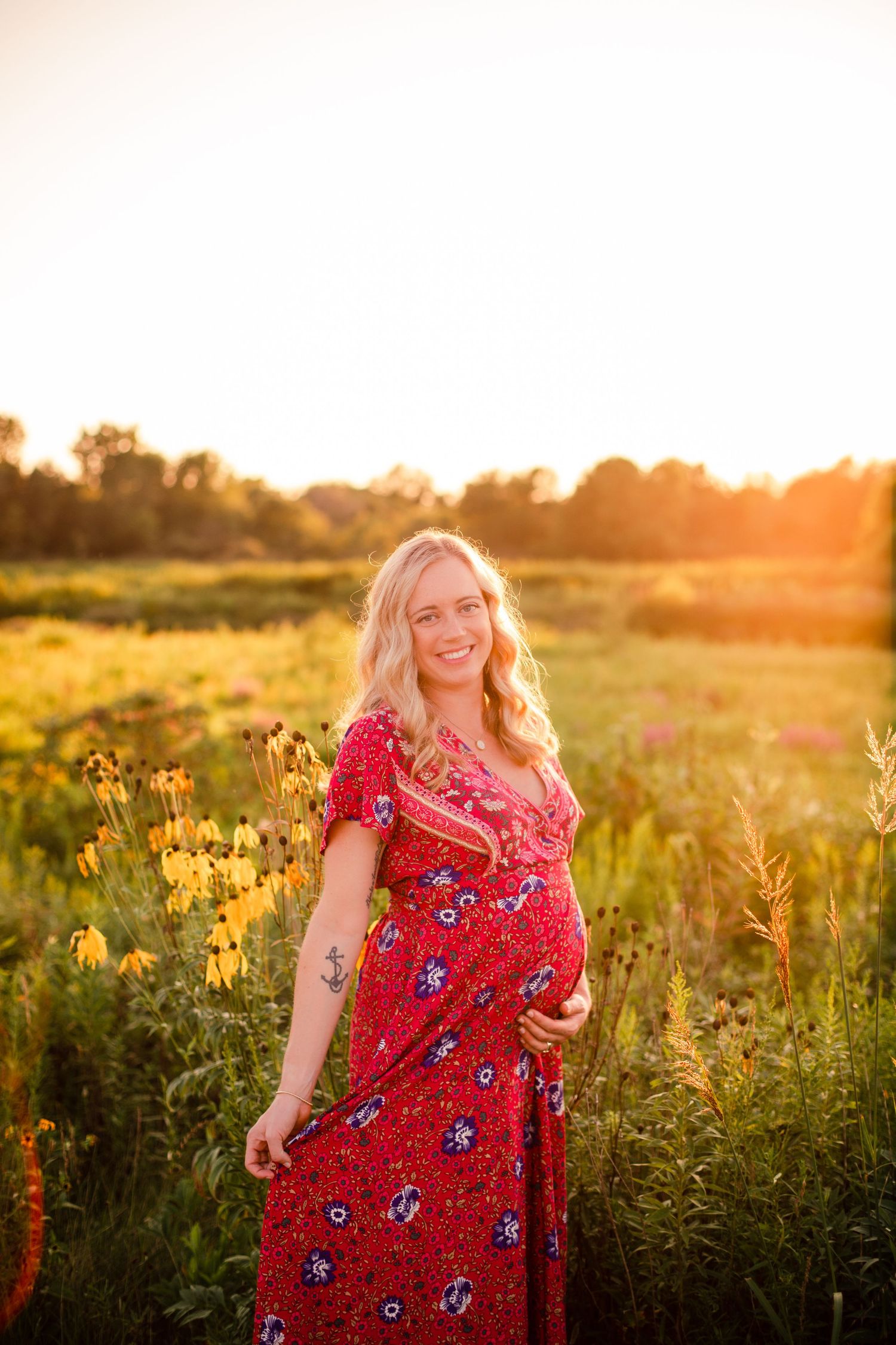 Maternity at sunset with wildflowers