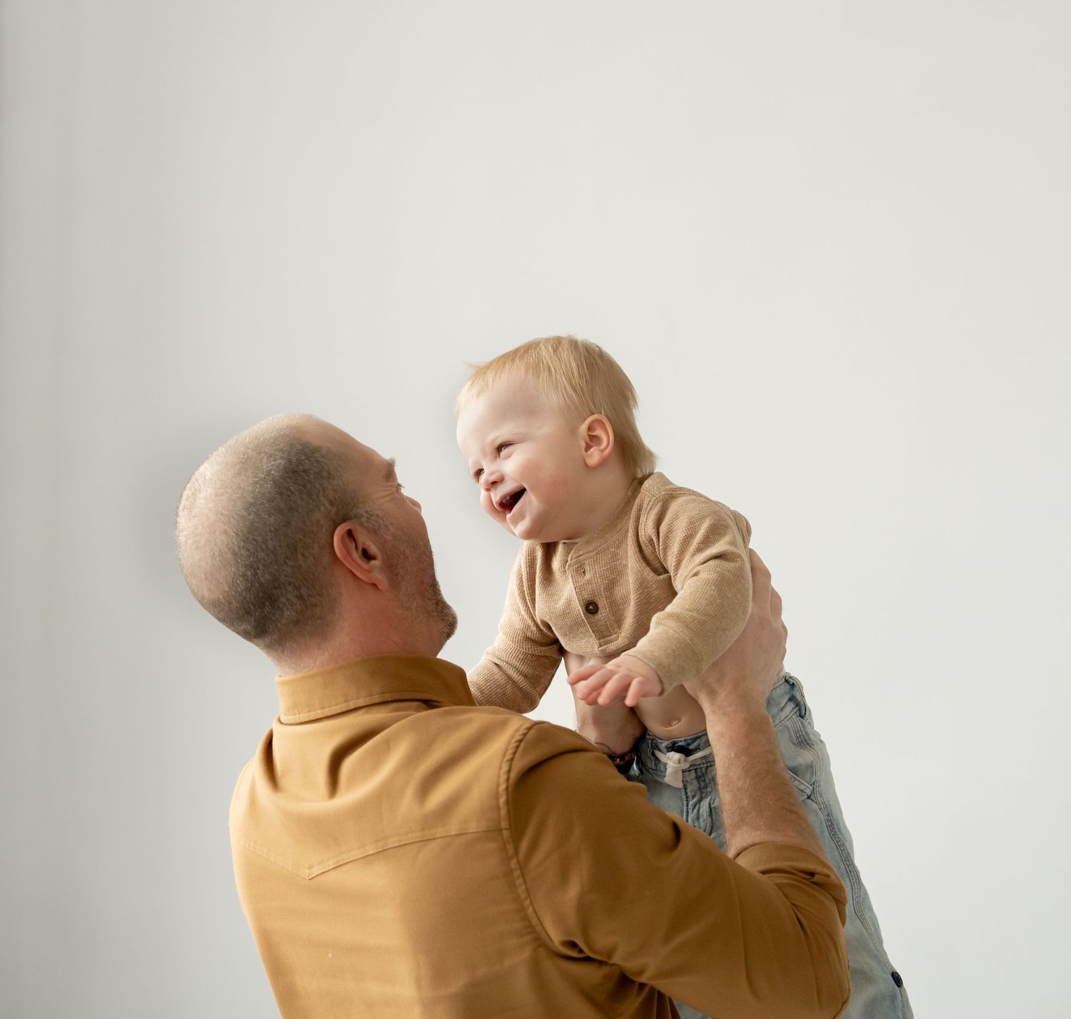 Dad and son playing