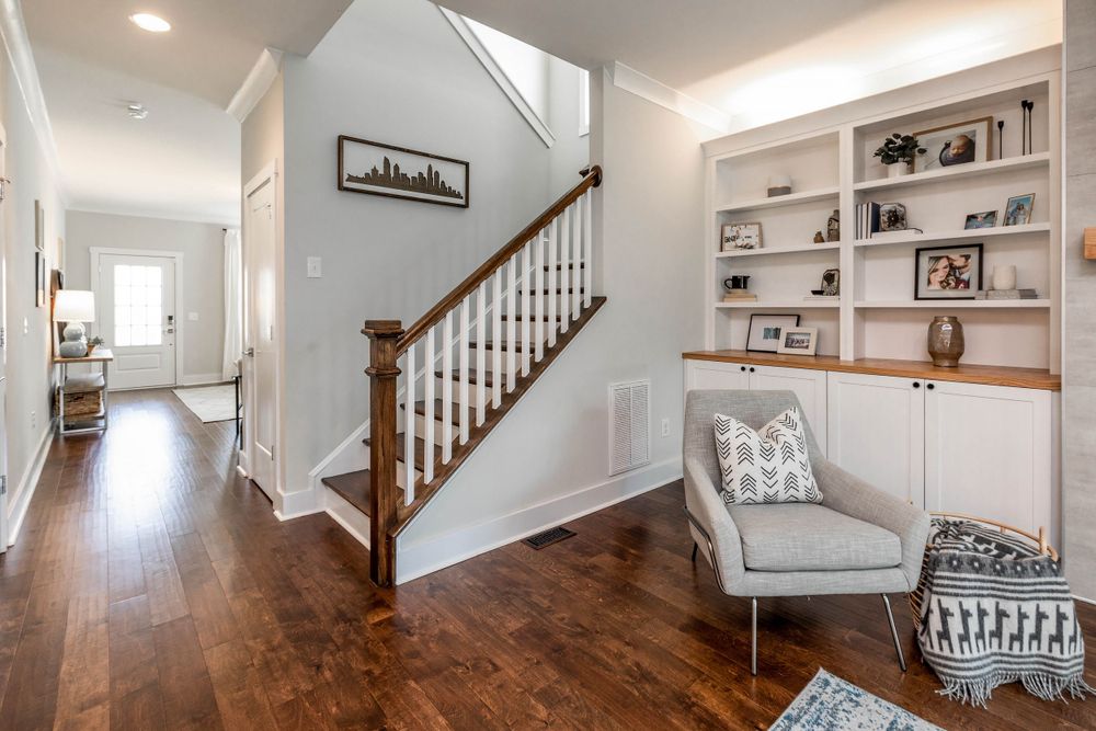 white sitting area with built in bookshelves by victoria leigh photography