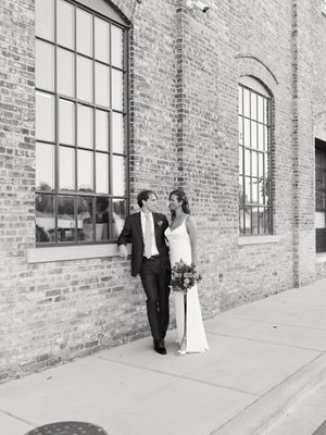 Bride and groom portrait in black and white at Garver Feed Mill. Classic and film-inspired wedding photography in Madison, Wisconsin.