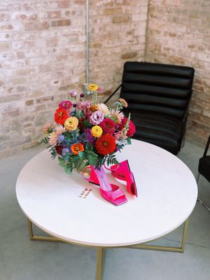 Garver Feed Mill bridal details hot pink heels and colorful bouquet. Classic and film-inspired wedding photography in Madison, Wisconsin.