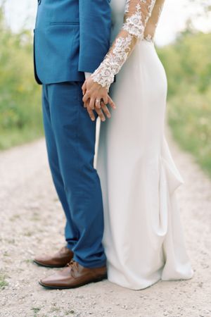 Bride and groom portrait holding hands, candid and details. Classic and film-inspired wedding photography in Madison, Wisconsin.