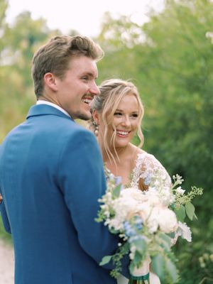 Bride and Groom candid outdoor portrait at The Wade House. Classic and film-inspired wedding photography in Madison, Wisconsin.
