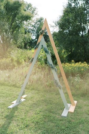 Wedding ceremony A-frame homemade decoration. Classic and film-inspired wedding photography in Madison, Wisconsin.