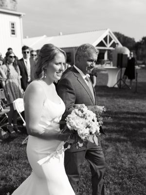 Father walking bride down the aisle crying emotional black and white. Classic and film-inspired wedding photography in Madison, Wisconsin.