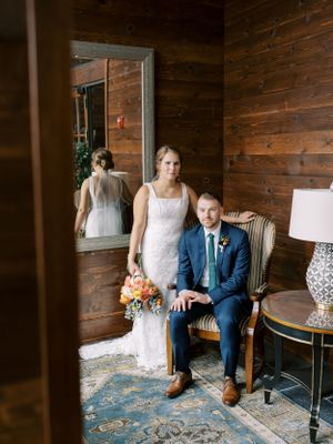 Rainy day portrait bride and groom indoor portrait with window light. Classic and film-inspired wedding photography in Madison, Wisconsin.