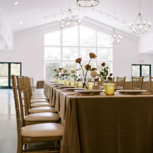 Wedding place settings and centerpieces at The Eloise in Mount Horeb. Classic and film-inspired wedding photography in Madison, Wisconsin.