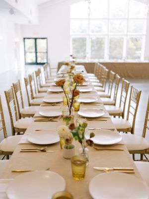 Wedding place settings and centerpieces at The Eloise in Mount Horeb. Classic and film-inspired wedding photography in Madison, Wisconsin.
