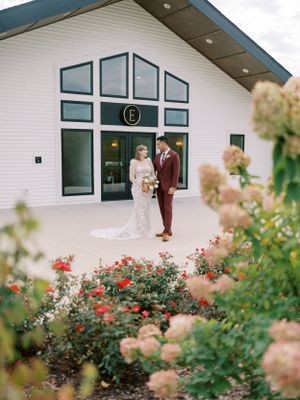 Bride and groom outdoor at The Eloise in Mount Horeb with burgundy. Classic and film-inspired wedding photography in Madison, Wisconsin.