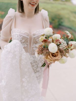 Bride NYC wedding dress and bouquet at The Eloise in Mount Horeb. Classic and film-inspired wedding photography in Madison, Wisconsin.