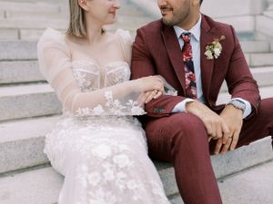 Bride and groom sitting portrait at the Wisconsin State Capitol. Classic and film-inspired wedding photography in Madison, Wisconsin.
