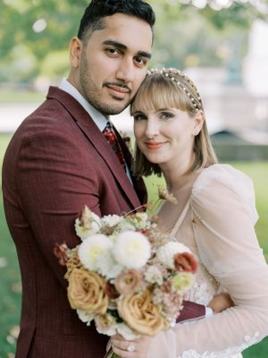 Bride and groom portrait with burgundy colors and chic NYC dress. Classic and film-inspired wedding photography in Madison, Wisconsin.