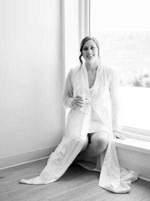Bride getting ready photo with mimosa at The Eloise Mount Horeb. Classic and film-inspired wedding photography in Madison, Wisconsin.