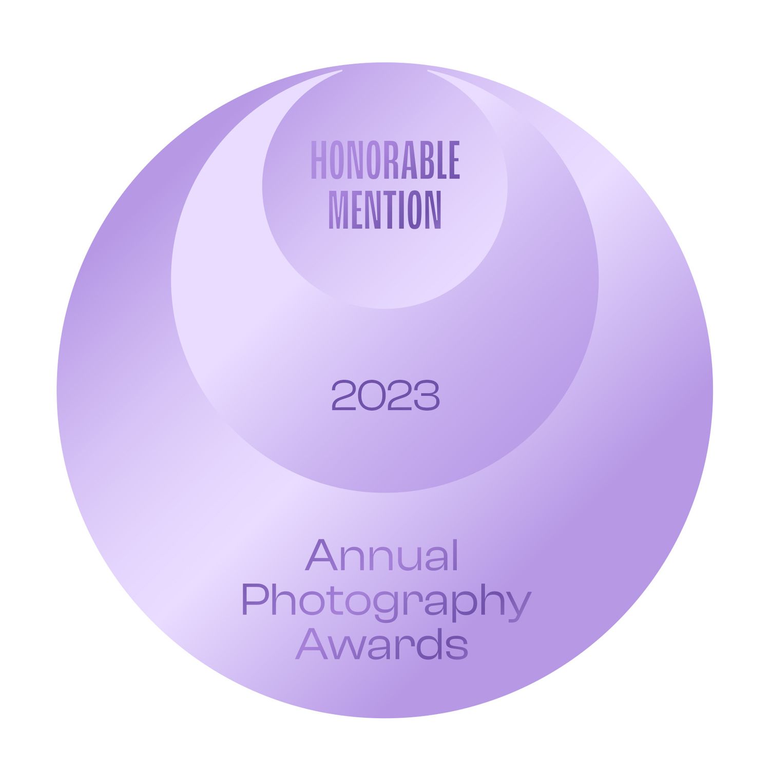 Purple circular award badge showing Honorable Mention for 2023 Annual Photography Awards.