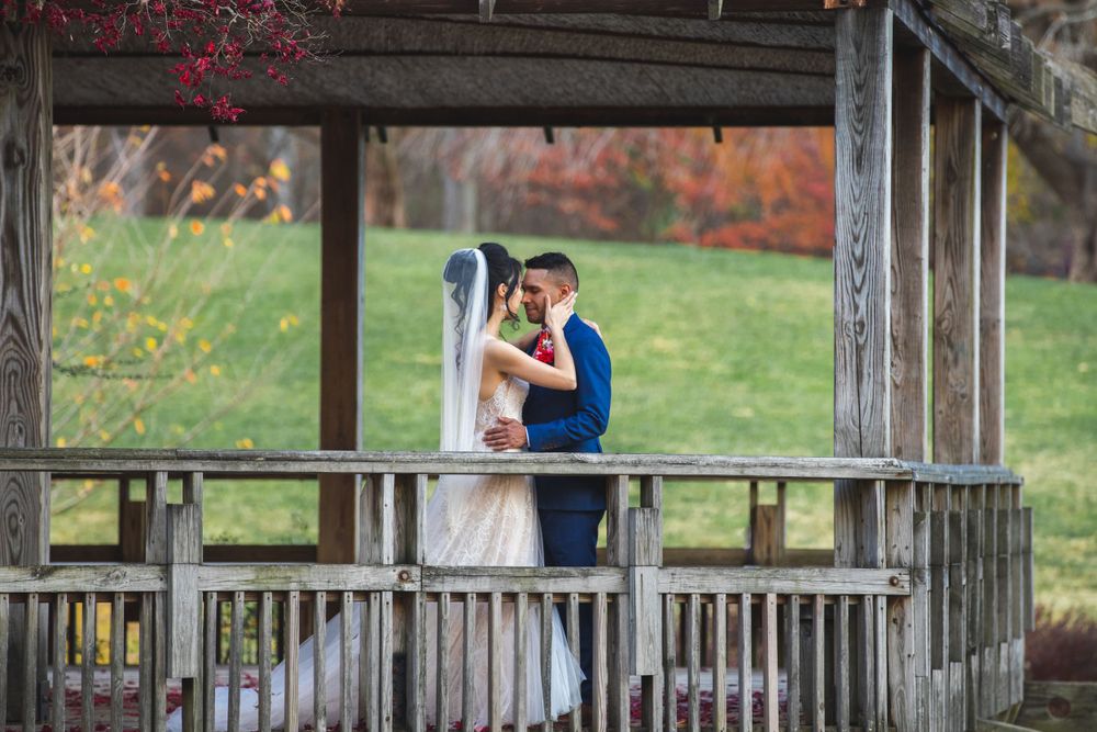 Bride and groom posing inside the Japanese Tea House at Brookside Gardens before wedding.