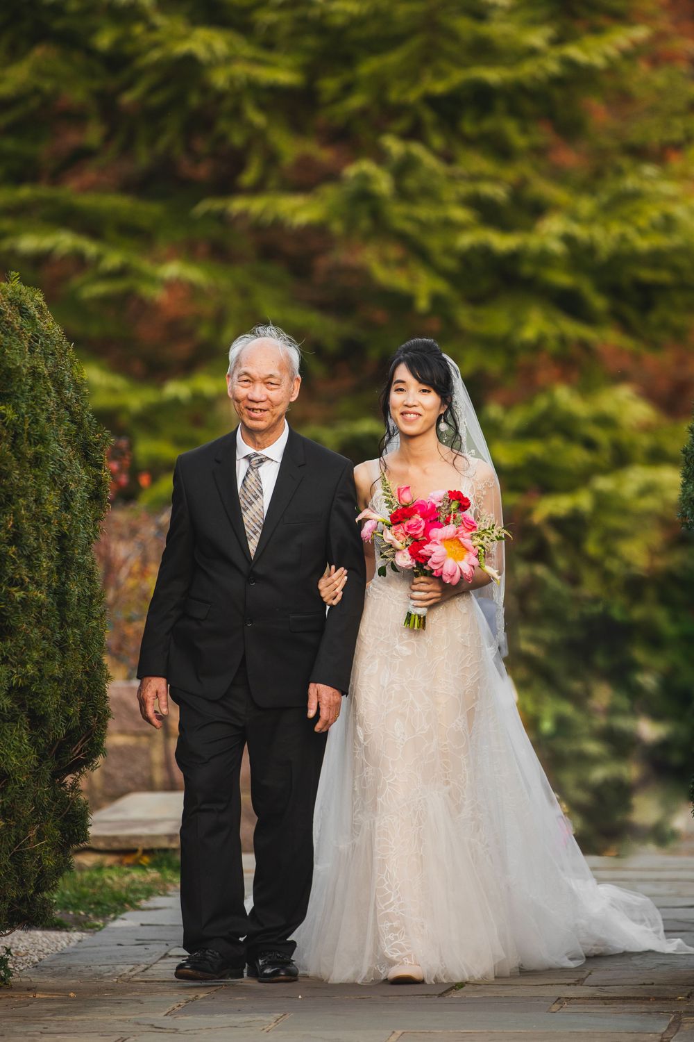 Bride and her father walking down the aisle at Brookside Garden wedding.
