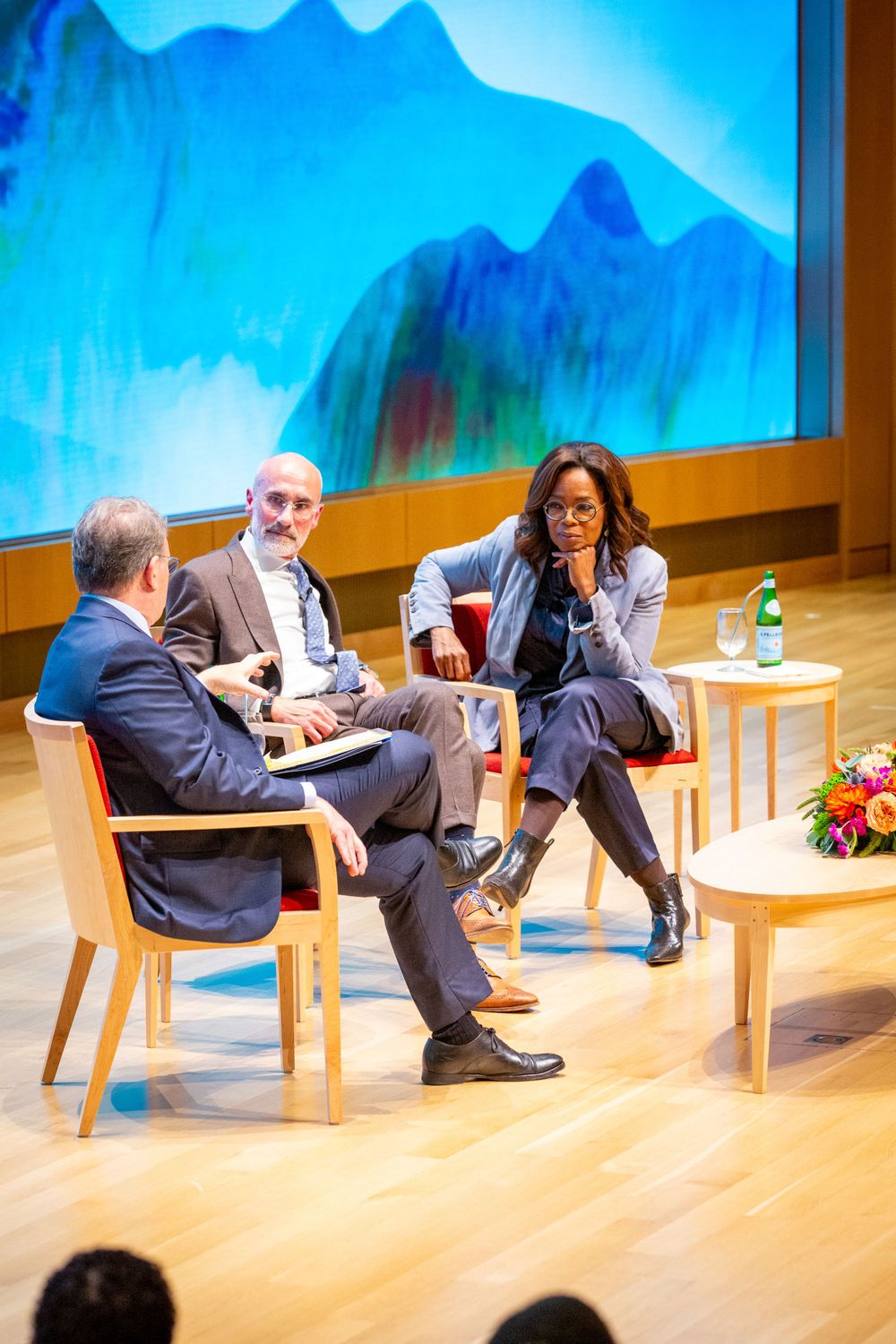 Oprah Winfrey and Harvard Business School/Harvard Kennedy School Professor Arthur Brooks speak during their book talk