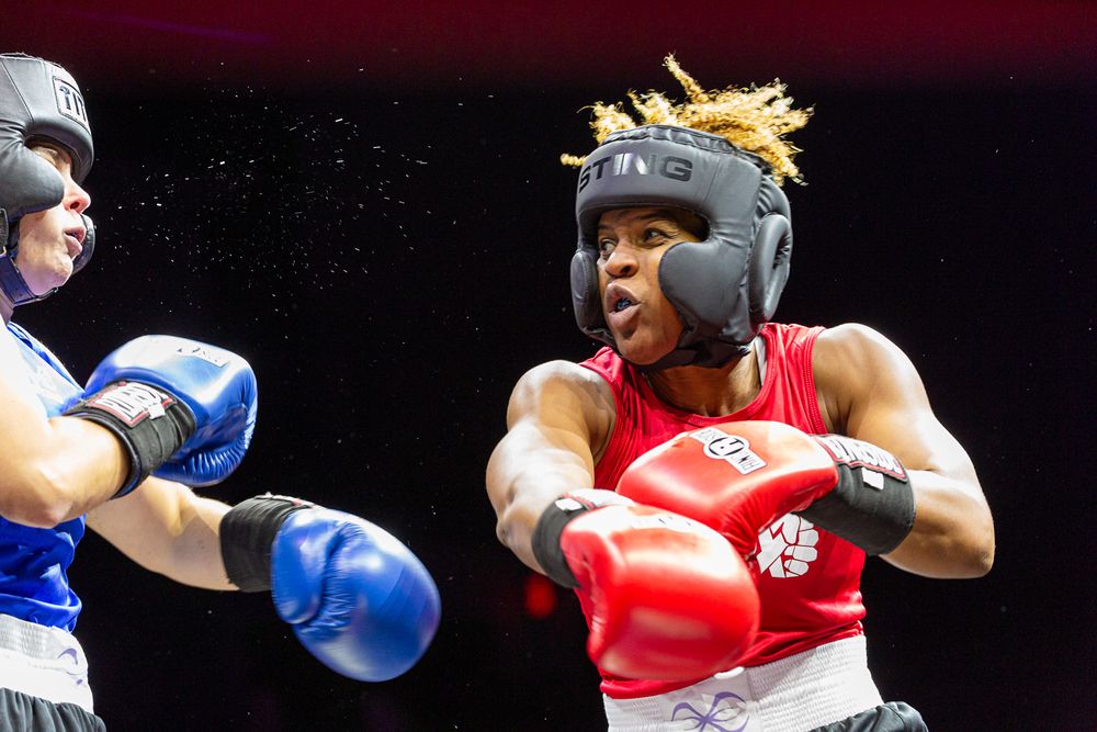 Lash Nolen connects on a punch during a charity boxing match