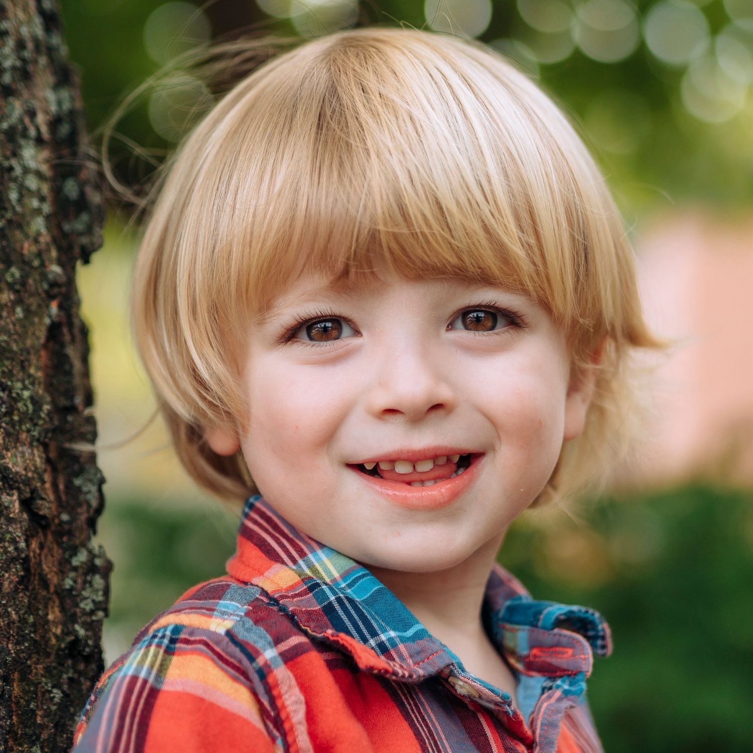 Pre-school aged boy, outdoor background