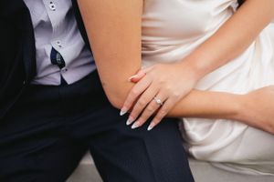 Close-up shots showing details of formal attire in white and navy blue.