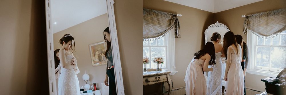 Wedding preparations taking place in elegant room with draped windows.