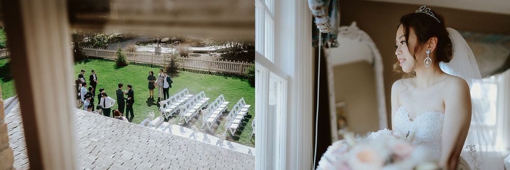 Aerial view of an outdoor wedding ceremony setup with white chairs on a lawn.