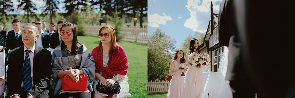 Outdoor wedding scene with evergreen trees and blue sky in the background.