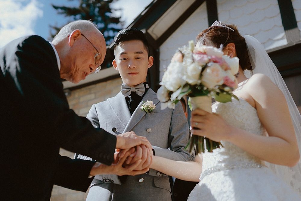Intimate wedding ceremony moments with floral bouquets and natural light.