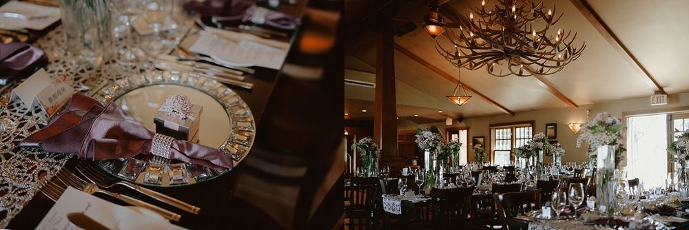 A rustic wedding reception venue featuring elegant table settings and chandeliers with a warm, ambient atmosphere.