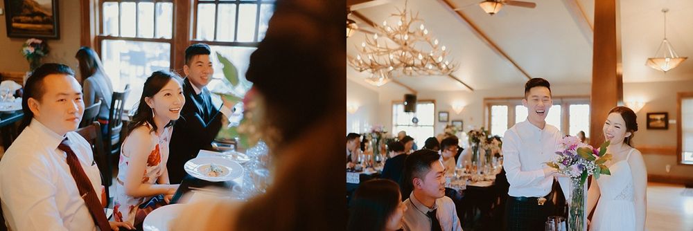 Wedding guests seated at tables smile and celebrate at an indoor reception venue.