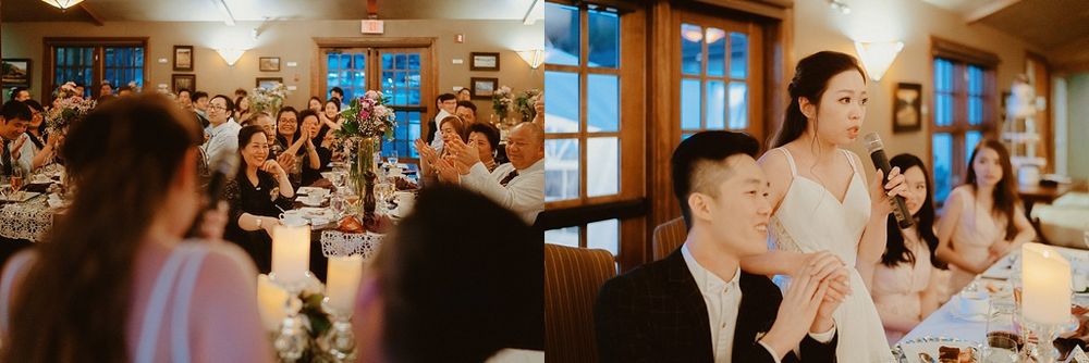 Wedding guests enjoy dinner and entertainment in a cozy venue with large windows.