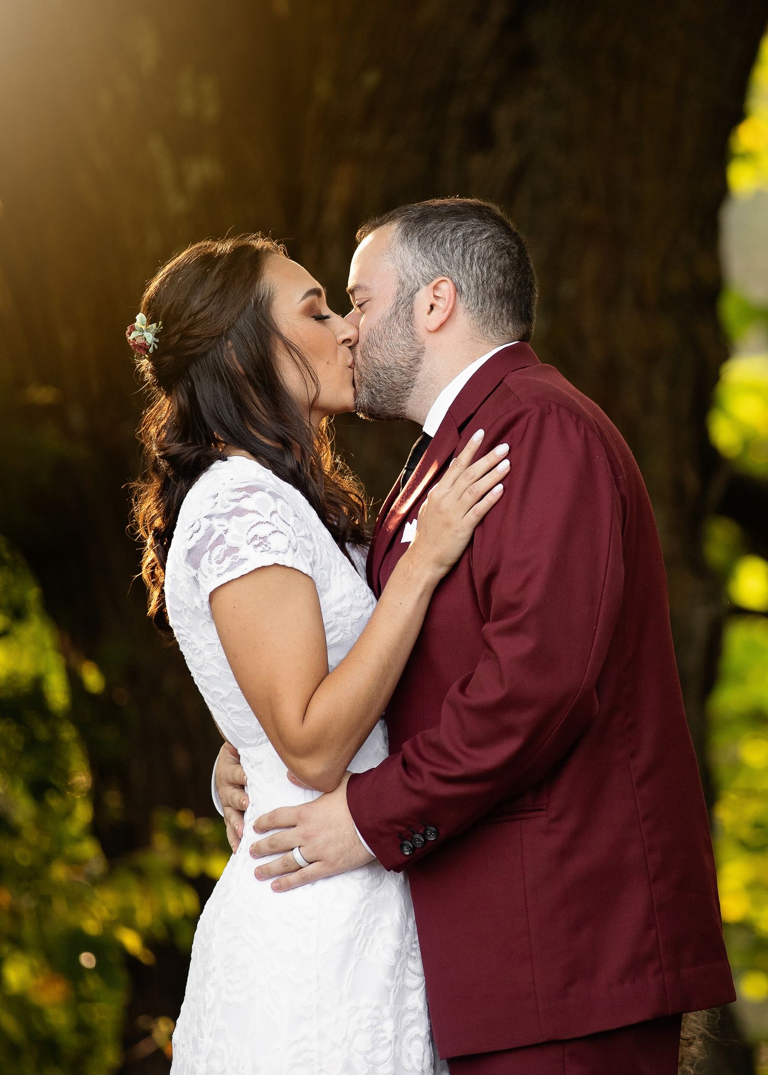a second crop of the wedding first kiss